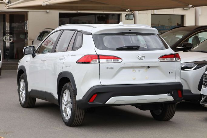 New Toyota Corolla Cross I, 2.0 l, 2024 in Dubai by JES Motors, White color.  | AUTO.AE