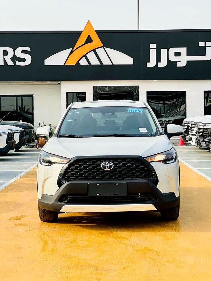 New Toyota Corolla Cross I, 2.0 l, 2020 in Dubai by ANDIAMO MOTORS FZE, White color. Chinese Specs | AUTO.AE