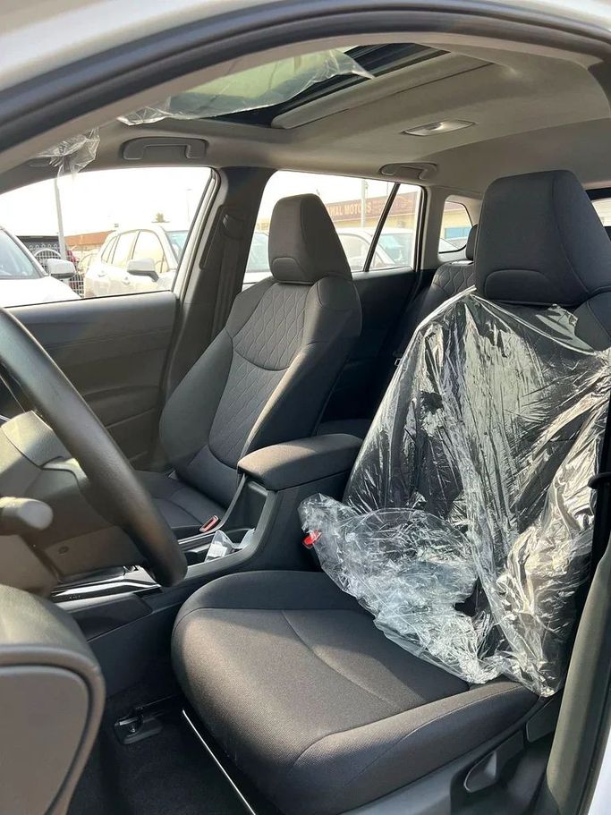 New Toyota Corolla Cross I, 2.0 l, 2020 in Dubai by ANDIAMO MOTORS FZE, White color. Chinese Specs | AUTO.AE