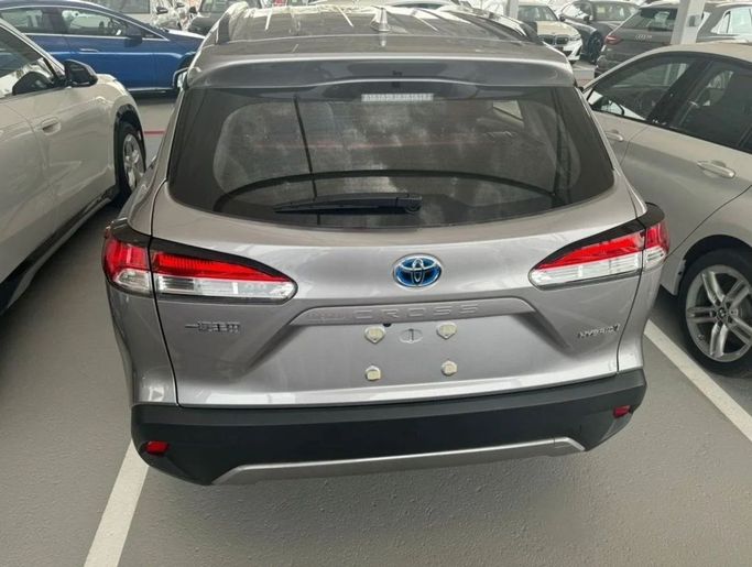New Toyota Corolla Cross I, 2.0 l, 2024 in Dubai by Mohamed Hakim Motors, Silver color. Chinese Specs | AUTO.AE