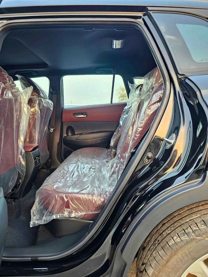 New Toyota Corolla Cross I, 1.8 l, 2024 in Dubai by SK Motors, Black color. GCC Specs | AUTO.AE