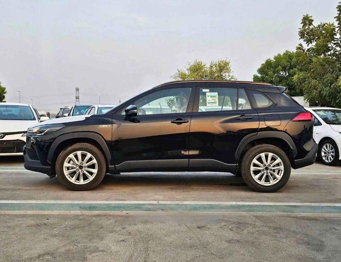 New Toyota Corolla Cross I, 1.8 l, 2024 in Dubai by SK Motors, Black color. GCC Specs | AUTO.AE