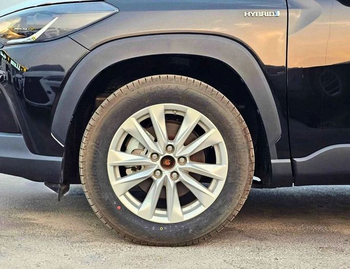 New Toyota Corolla Cross I, 1.8 l, 2024 in Dubai by SK Motors, Black color. GCC Specs | AUTO.AE