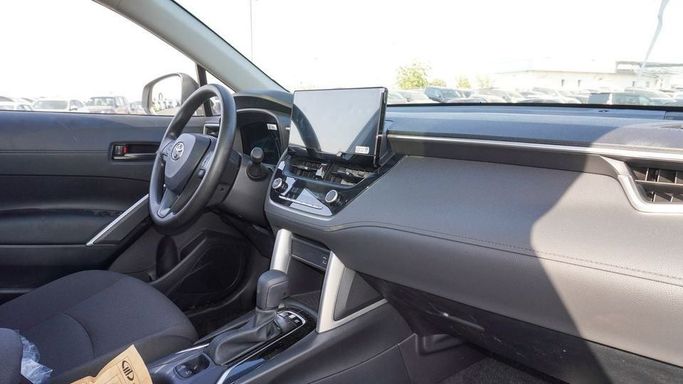 Новый Toyota Corolla Cross I, 2.0 л, 2024 в Дубае от Najem Motors Белый цвет. Китайская | AUTO.AE