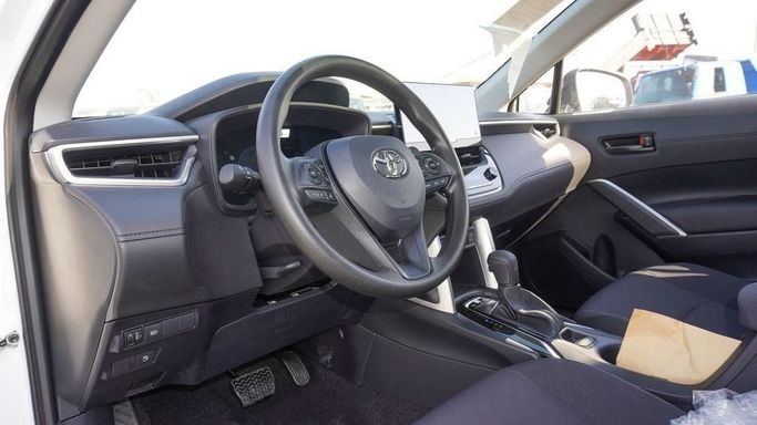 Новый Toyota Corolla Cross I, 2.0 л, 2024 в Дубае от Najem Motors Белый цвет. Китайская | AUTO.AE