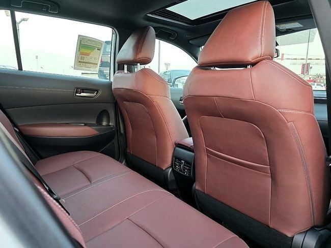 New Toyota Corolla Cross I, 1.8 l, 2025 in Dubai by Soltan Auto, White color. GCC Specs | AUTO.AE