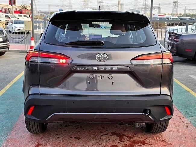New Toyota Corolla Cross I, 1.8 l, 2025 in Dubai by Soltan Auto, Grey color. GCC Specs | AUTO.AE