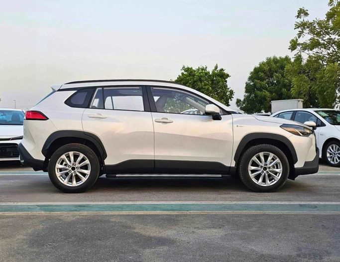New Toyota Corolla Cross I, 2.0 l, 2025 in Dubai by SK Motors, White color. Other | AUTO.AE