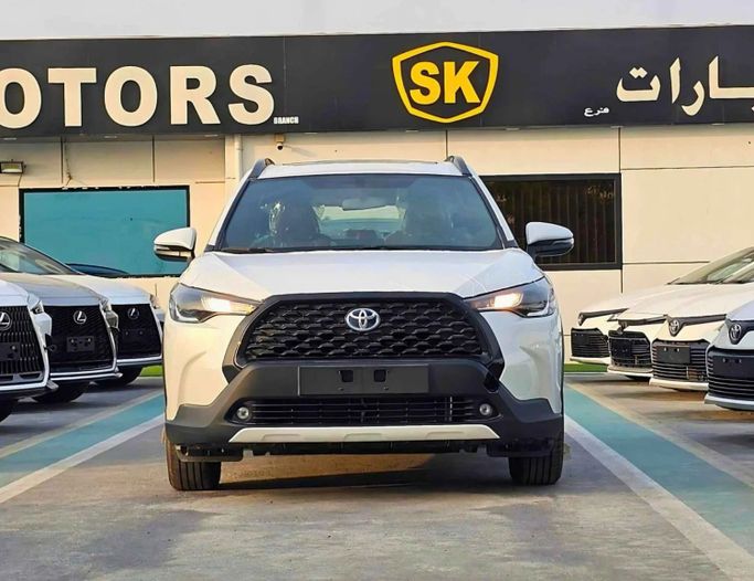 New Toyota Corolla Cross I, 1.8 l, 2024 in Dubai by SK Motors, White color. Other | AUTO.AE