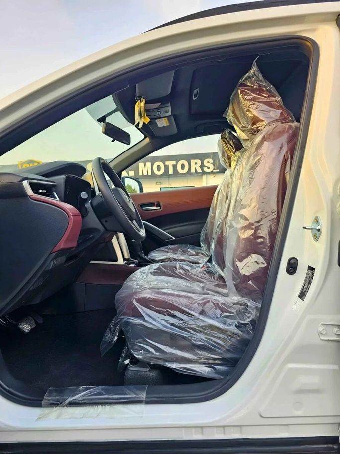 New Toyota Corolla Cross I, 1.8 l, 2024 in Dubai by SK Motors, White color. Other | AUTO.AE