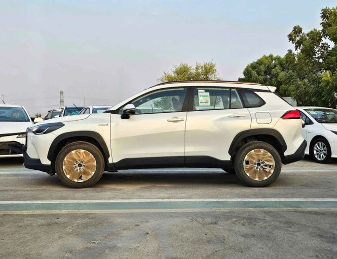 New Toyota Corolla Cross I, 1.8 l, 2024 in Dubai by SK Motors, White color. Other | AUTO.AE