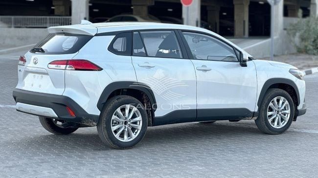 Новый Toyota Corolla Cross I, 2.0 л, 2025 в Дубае от Falcons GT Motors FZCO Белый цвет. Китайская | AUTO.AE