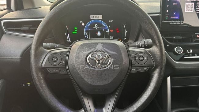 New Toyota Corolla Cross I, 2.0 l, 2024 in Dubai by Falcons GT Motors FZCO, White color. European Specs | AUTO.AE