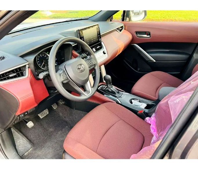 New Toyota Corolla Cross I, 1.8 l, 2024 in Dubai by We Can Motors, Black color. GCC Specs | AUTO.AE