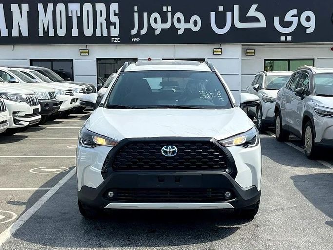 New Toyota Corolla Cross I, 1.8 l, 2024 in Dubai by We Can Motors, White color. GCC Specs | AUTO.AE