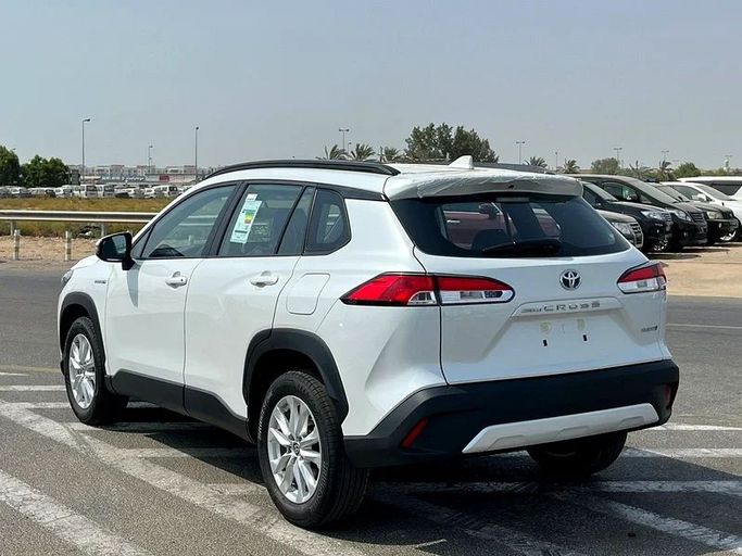 New Toyota Corolla Cross I, 1.8 l, 2024 in Dubai by We Can Motors, White color. GCC Specs | AUTO.AE