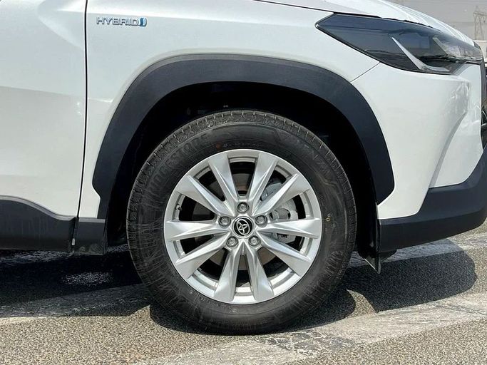New Toyota Corolla Cross I, 1.8 l, 2024 in Dubai by We Can Motors, White color. GCC Specs | AUTO.AE