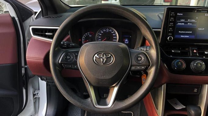 Подержанный Toyota Corolla Cross I, 2.0 л, 2023 в Дубае от Cariva Used Cars  Белый цвет. GCC | AUTO.AE