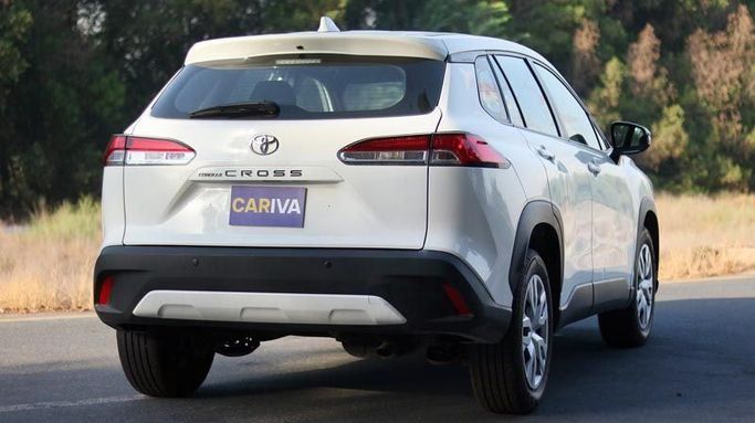 Подержанный Toyota Corolla Cross I, 1.8 л, 2022 в Дубае от Cariva Used Cars  Белый цвет. GCC | AUTO.AE