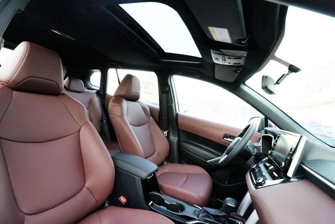 New Toyota Corolla Cross I, 1.8 l, 2024 in Dubai by Atlantic Motors FZCO, White color. GCC Specs | AUTO.AE