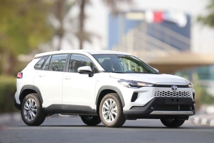 New Toyota Corolla Cross I, 1.8 l, 2025 in Dubai by Atlantic Motors FZCO, White color. GCC Specs | AUTO.AE