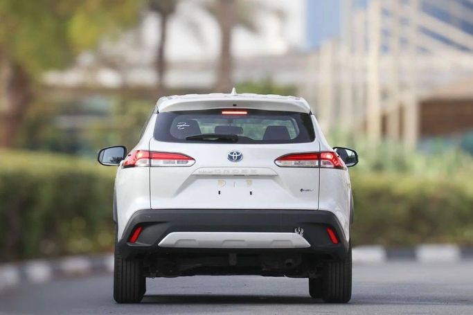 New Toyota Corolla Cross I, 1.8 l, 2025 in Dubai by Atlantic Motors FZCO, White color. GCC Specs | AUTO.AE