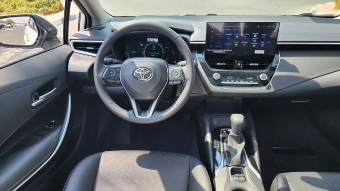 New Toyota Corolla Sporty XII (E210), 1.8 l, 2024 in Dubai by Alwan Global Cars, White color. Other | AUTO.AE