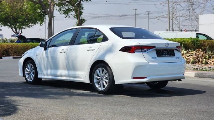New Toyota Corolla Sporty XII (E210), 1.8 l, 2024 in Dubai by Alwan Global Cars, White color. Other | AUTO.AE