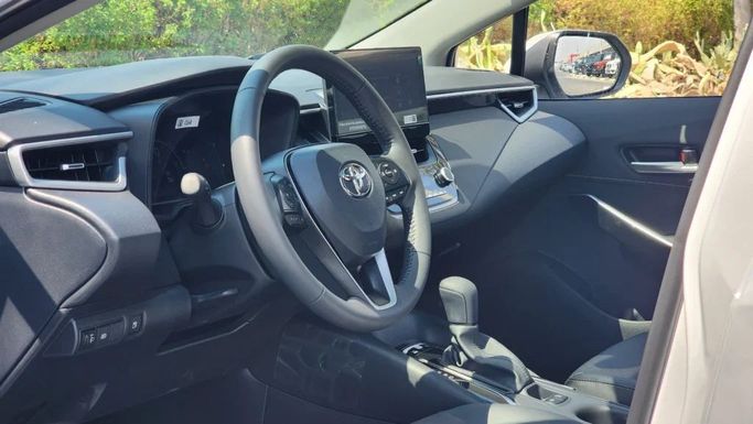 New Toyota Corolla Sporty XII (E210), 1.8 l, 2024 in Dubai by Alwan Global Cars, White color. Other | AUTO.AE