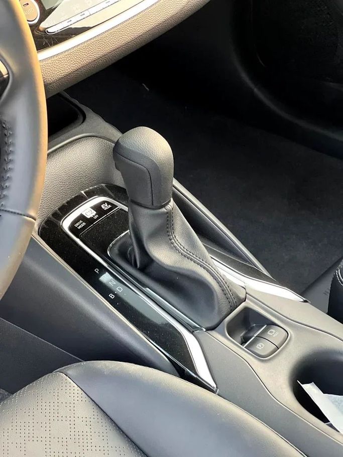 Новый Toyota Corolla Sporty XII (E210) Рестайлинг, 1.8 л, 2023 в Дубае от ANDIAMO MOTORS FZE Белый цвет. Китайская | AUTO.AE