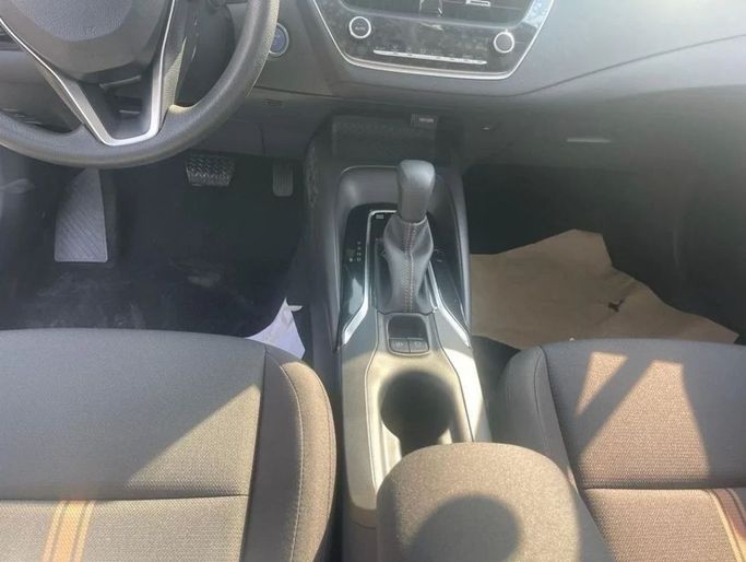 New Toyota Corolla Sporty XII (E210) Facelift, 1.8 l, 2025 in Dubai by Mohamed Hakim Motors, White color. GCC Specs | AUTO.AE