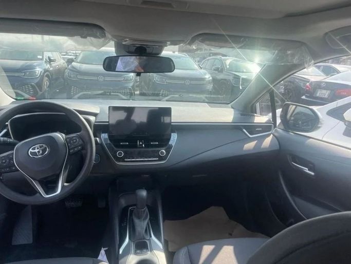 New Toyota Corolla Sporty XII (E210) Facelift, 1.8 l, 2025 in Dubai by Mohamed Hakim Motors, White color. GCC Specs | AUTO.AE
