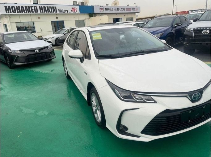 New Toyota Corolla XII (E210), 1.8 l, 2023 in Dubai by Mohamed Hakim Motors, White color. Other | AUTO.AE
