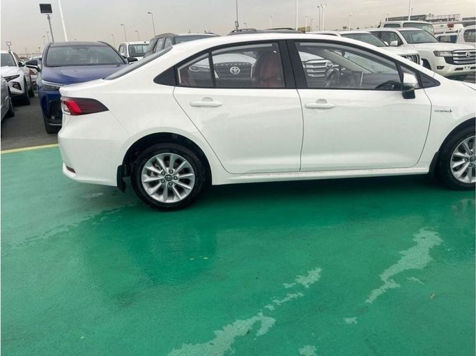 New Toyota Corolla XII (E210), 1.8 l, 2023 in Dubai by Mohamed Hakim Motors, White color. Other | AUTO.AE