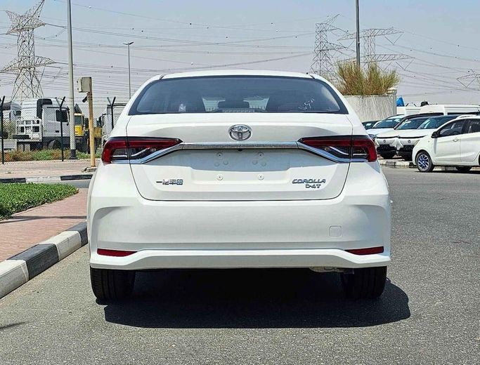 New Toyota Corolla Sporty XII (E210), 1.2 l, 2024 in Dubai by SK Motors, White color. Chinese Specs | AUTO.AE