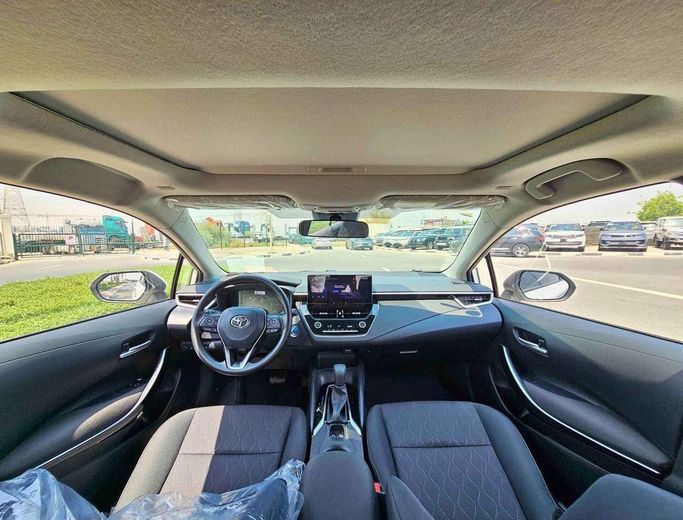 New Toyota Corolla XII (E210), 1.8 l, 2025 in Dubai by SK Motors, White color. Chinese Specs | AUTO.AE