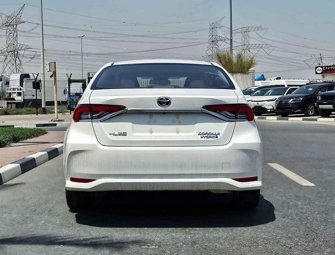 New Toyota Corolla XII (E210), 1.8 l, 2025 in Dubai by SK Motors, White color. Chinese Specs | AUTO.AE