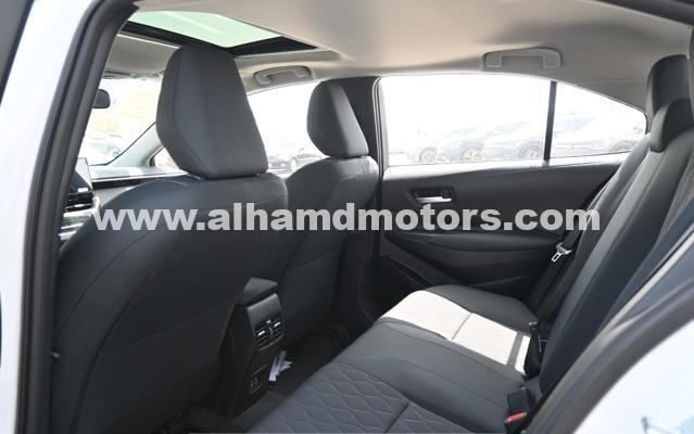 New Toyota Corolla XII (E210), 1.8 l, 2024 in Dubai by Alhamd Motors, White color. Other | AUTO.AE