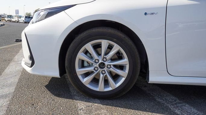 Новый Toyota Corolla XII (E210), 1.8 л, 2024 в Дубае от Najem Motors Белый цвет. Китайская | AUTO.AE