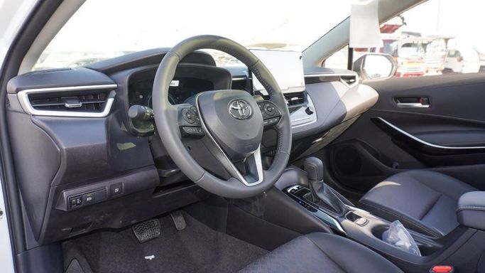 Новый Toyota Corolla XII (E210), 1.8 л, 2024 в Дубае от Najem Motors Белый цвет. Китайская | AUTO.AE