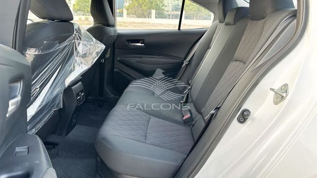 New Toyota Corolla XII (E210), 1.8 l, 2025 in Dubai by Falcons GT Motors FZCO, White color. Chinese Specs | AUTO.AE