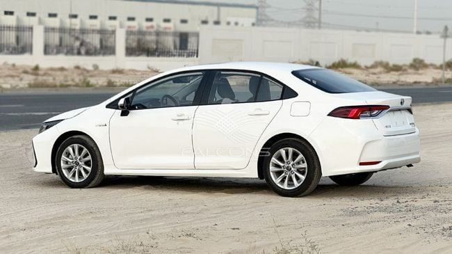 New Toyota Corolla XII (E210), 1.8 l, 2025 in Dubai by Falcons GT Motors FZCO, White color. Chinese Specs | AUTO.AE