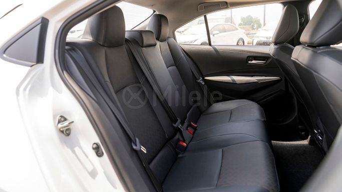 Новый Toyota Corolla Sporty XII (E210) Рестайлинг, 1.8 л, 2025 в Дубае от Milele Белый цвет. Other | AUTO.AE