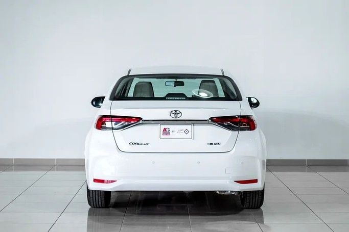 Подержанный Toyota Corolla XII (E210), 1.6 л, 2024 в Дубае от AG Motors Белый цвет. GCC | AUTO.AE