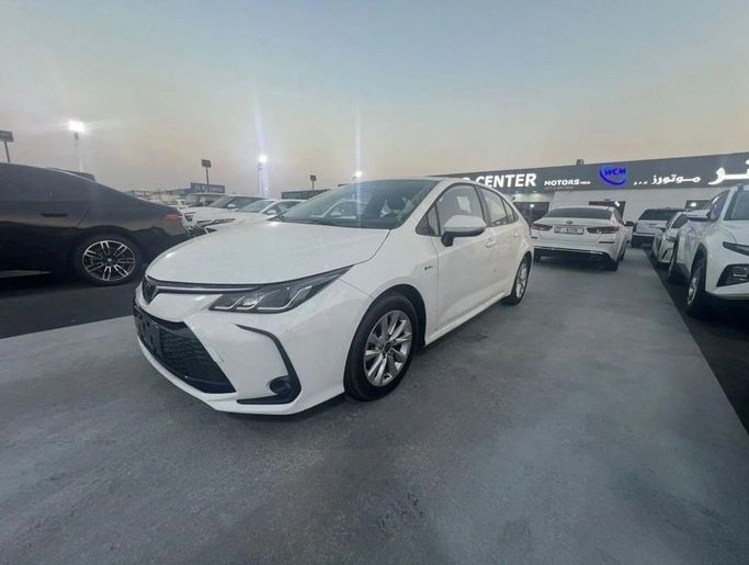 Новый Toyota Corolla Sporty XII (E210) Рестайлинг, 1.8 л, 2024 в Дубае от World Center Motors FZE Белый цвет. Китайская | AUTO.AE
