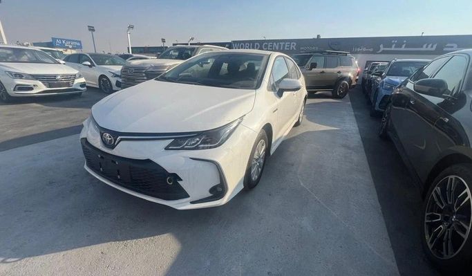 Новый Toyota Corolla Sporty XII (E210) Рестайлинг, 1.8 л, 2024 в Дубае от World Center Motors FZE Белый цвет. Китайская | AUTO.AE