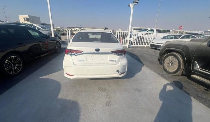 Новый Toyota Corolla Sporty XII (E210) Рестайлинг, 1.8 л, 2024 в Дубае от World Center Motors FZE Белый цвет. Китайская | AUTO.AE