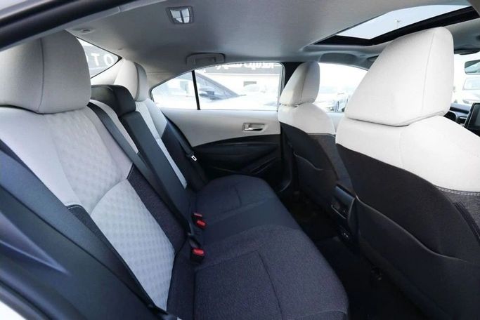 New Toyota Corolla XII (E210), 1.8 l, 2025 in Dubai by Atlantic Motors FZCO, White color. Other | AUTO.AE