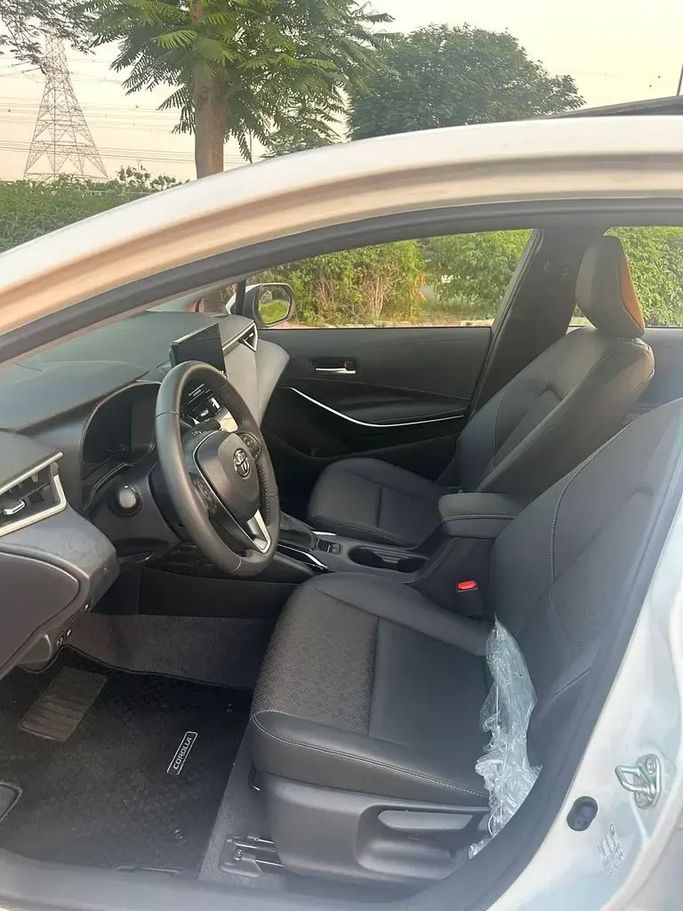 Новый Toyota Corolla XII (E210), 1.8 л, 2025 в Дубае от First Choice Motors Белый цвет. Китайская | AUTO.AE
