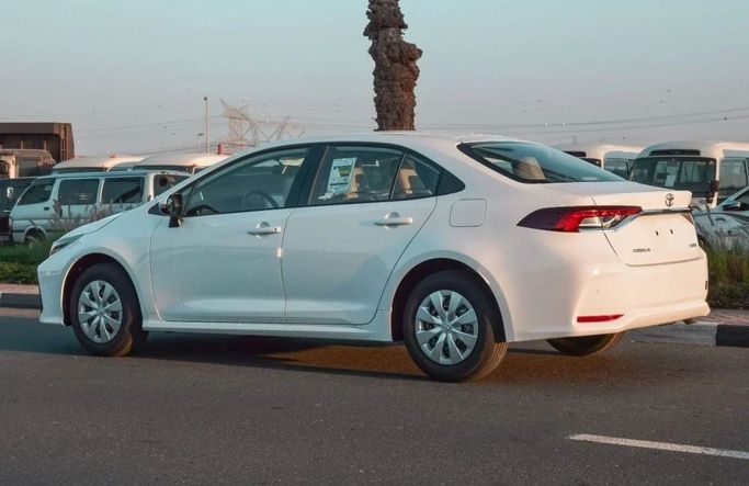 New Toyota Corolla XII (E210), 1.6 l, 2025 in Dubai by White motors FZE, White color. GCC Specs | AUTO.AE
